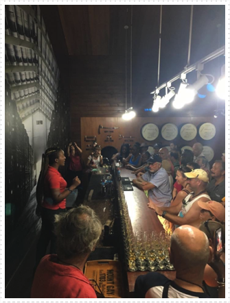 A captive audience learning about rum